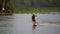 Athlete wakeboarder floats on water