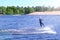 Athlete wakeboarder performs a jump with a somersault in the air