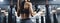 An Athlete Woman\\\'s Intense Training with a Punching Bag, Equipped in Sportswear and Gloves. Generative AI