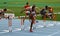 Athletes compete in the 110 meters final