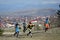 Athletes compete during a spring ski touring and trail running