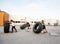 Athletes Doing Tire-Flip Exercise Outdoors