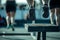 athletes feet in midair above a plyometric jump box