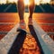 Athletes feet in running shoes on stadium starting line, poised