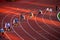 Athletes Positioned at Starting Blocks for the Commencement of 200m Sprint Race on the Running Track - Track and Field