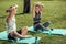 Athletes warming hands before training in the park