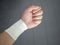 Athleteâ€™s sprained wrist taped up with a wrist tape job