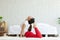 Athletic Asian woman practice yoga king cobra or Raja Bhudjangasana pose