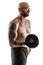 Athletic bald, tattooed man in black shorts is posing with a dumbbell isolated on white background. Close-up portrait.