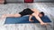 Athletic flexible yogi man doing workout exercise hand standing position high angle