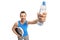 Athletic guy holding a weight scale and a bottle of water