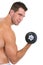 Athletic man with strong biceps rising dumbbell