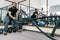 Athletic muscular bearded man exercising in the gym with battle ropes. Sport, training, people, healthy lifestyle concept
