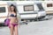 Athletic woman in caravan parking