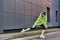 athletic woman in lime color hoodie