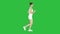 Athletic woman running on a Green Screen, Chroma Key.