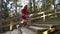 Athletic woman running up the Fitness Stairs in a natural park