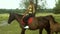 Athletic young girl in she rides a horse