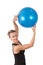 Athletic young woman with blue ball