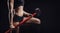 Athletic young woman engaged in gym with hammer and tire wheel. Concept workout fitness training