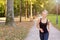 Athletic young woman jogging in a park