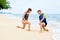 Athletics. Fit Couple Stretching, Exercising On Beach. Sports, F