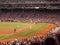 Athletics Pitcher throws a pitch to Red Sox batter as he swings