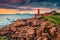 Atlantic Ocean coast with granite rocks and lighthouse, Ploumanach, France