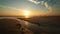 Atlantic ocean sunset with surging waves at Fonte da Telha beach, Portugal