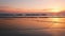 Atlantic ocean sunset with surging waves at Fonte da Telha beach, Portugal