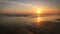 Atlantic ocean sunset with surging waves at Fonte da Telha beach, Portugal