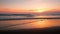 Atlantic ocean sunset with surging waves at Fonte da Telha beach, Portugal