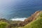 Atlantic ocean waves meet the cliffs of Ponta do Pargo on Madeira island, Portugal