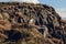 Atlantic Puffins sitting on cliff, birds in nesting colony, arctic black and white cute bird with colouful beak, birds