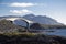 Atlantic road in Norway connecting small islands over summer fjord
