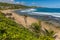 Atlantic waves arrive on the curved beach at Bathsheba on the Atlantic coast of Barbados