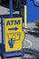 ATM Euronet with symbol hand holding a Bank card