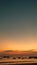 the atmosphere of the sunset on the beach with a view of the ship