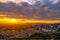 The atmosphere before the sunset at Bukchon hanok village, tourists dressed in hanbok to take pictures and watch the view because