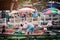 The atmosphere of trading goods and food, on vintage boats at Tha Kha Floating Market