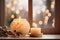 Atmospheric Christmas window sill decoration with white candle burning