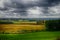 Atmospheric landscape with gathering storm clouds