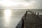 Atmospheric and Moody Long Exposure Photograph of Stone Pier at Brighton, East Sussex, England, UK with copy space