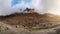 Atmospheric morning mountain landscape. Panoramic landscape in highlands. Sharp peaks of the rocks look out from the clouds and