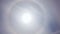 Atmospheric optical effect circle around the sun on hot summer day. Atmospheric halo phenomenon around the sun