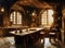 atmospheric painting of an old tudor period hall kitchen with jars on shelves and pans hung on walls and a wooden table with food