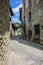 On the atmospheric paved street and Rustic house in the medieval village of Rupit in the mountainous part Catalonia. Spain