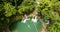 Atmospheric perspective of People in Cambugahay falls in Siquijor Island.