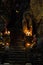 Atmospheric temple stone building in cave falls pillar sunlight, old staircase candles