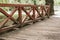 Atmospheric wooden bridge with railings